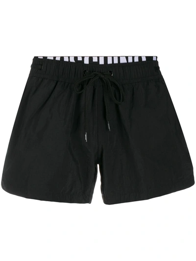 Shop Moschino Logo Drawstring Swim Shorts In Black