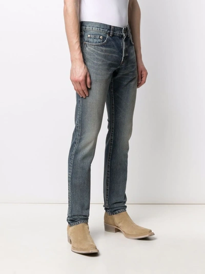 Shop Saint Laurent Mid-rise Slim-fit Jeans In Blue