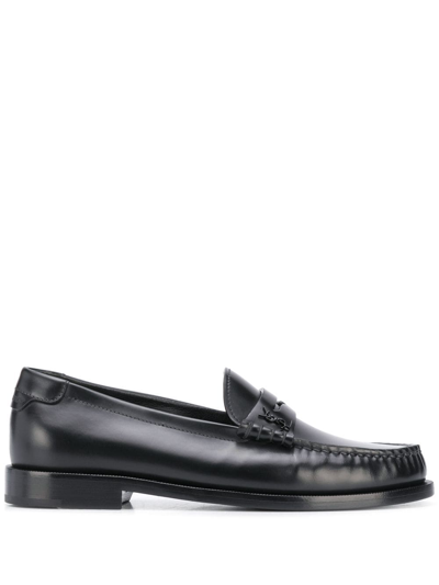 Shop Saint Laurent Monogram Leather Loafers In Black