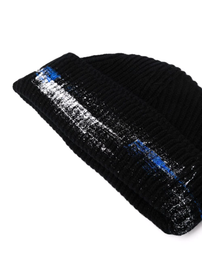 Shop Ader Error Paint-detail Ribbed-knit Beanie In 黑色