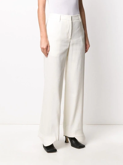 Off-white Flared Curved Cuff Trousers In Neutrals