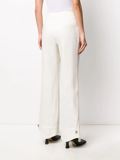 Off-white Flared Curved Cuff Trousers In Neutrals