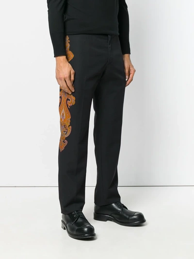 Shop Alexander Mcqueen Paisley Patch Trousers In Black