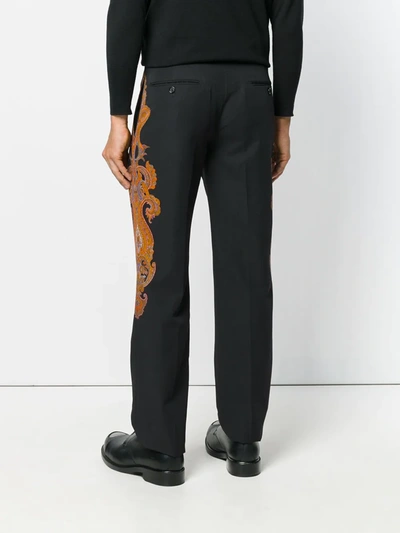 Shop Alexander Mcqueen Paisley Patch Trousers In Black