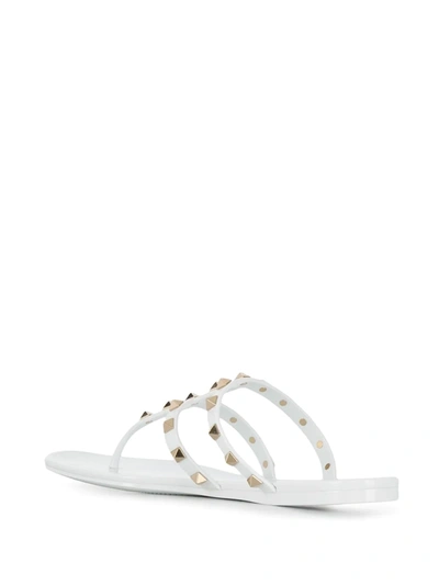 Shop Valentino Rockstud Thong-strap Sandals In White