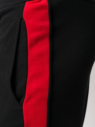 Shop Alexander Mcqueen Side-stripe Track Pants In Black