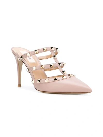 Shop Valentino Rockstud Mules In Pink