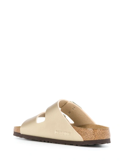 Shop Birkenstock Arizona Buckled Sandals In Gold