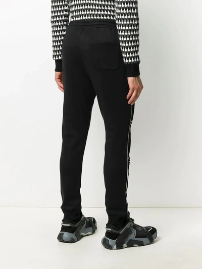 Shop Valentino Logo Tape Track Trousers In Black