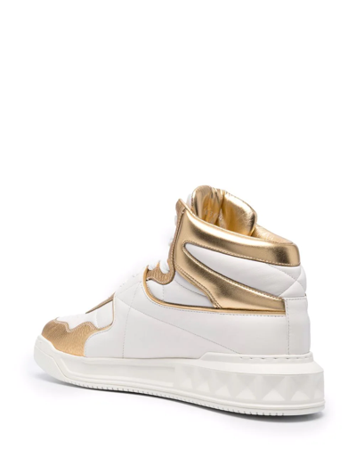 Shop Valentino Roman Stud High-top Sneakers In Weiss