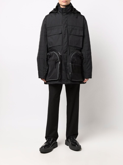 Shop Balenciaga Transformer Gym Bag Parka Coat In Schwarz