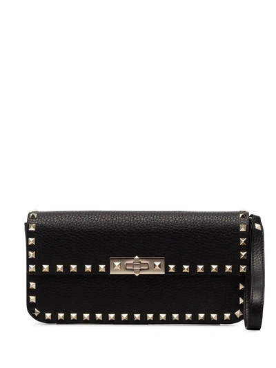 Shop Valentino Rockstud Clutch In Black