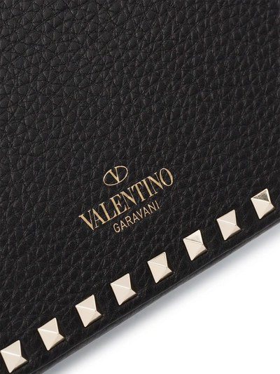 Shop Valentino Rockstud Clutch In Black