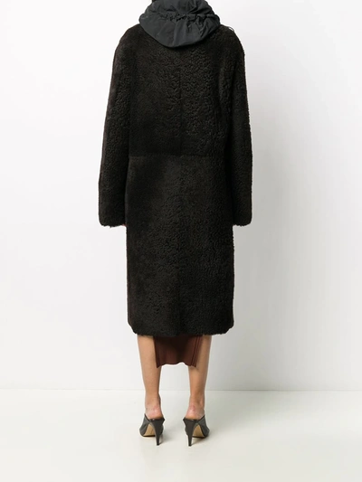 Shop Bottega Veneta Hooded Shearling Coat In Black