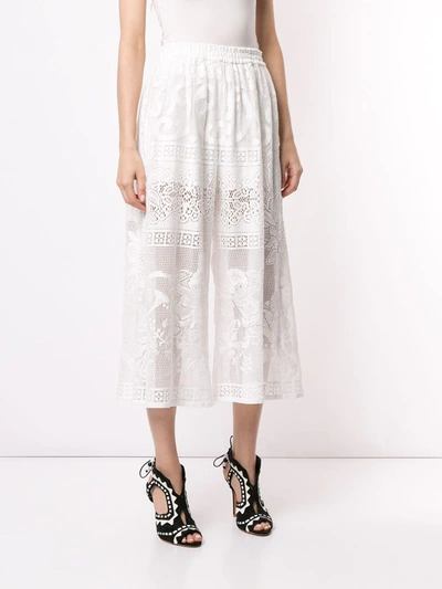 Shop Dolce & Gabbana Cropped Lace Trousers In White
