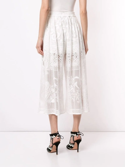 Shop Dolce & Gabbana Cropped Lace Trousers In White