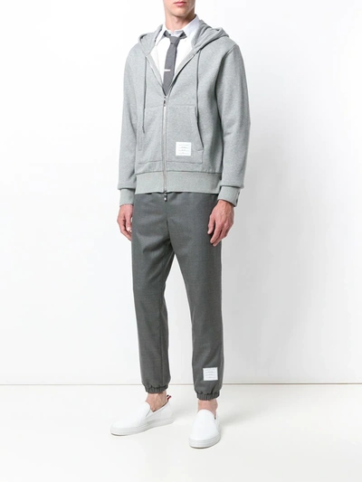 Shop Thom Browne Center-back Stripe Zip-up Hoodie In Grey