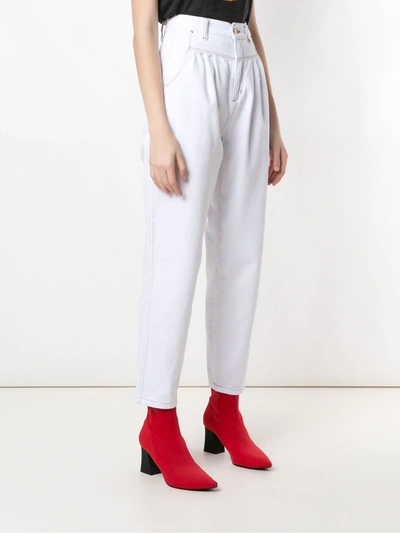 Shop Amapô Pleated Jeans In White