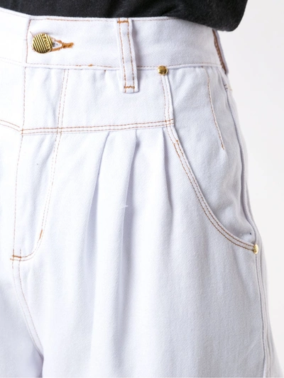 Shop Amapô Pleated Jeans In White
