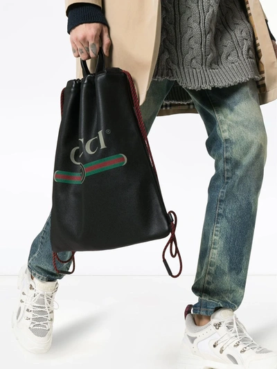 Shop Gucci Logo Print Leather Drawstring Backpack In Black