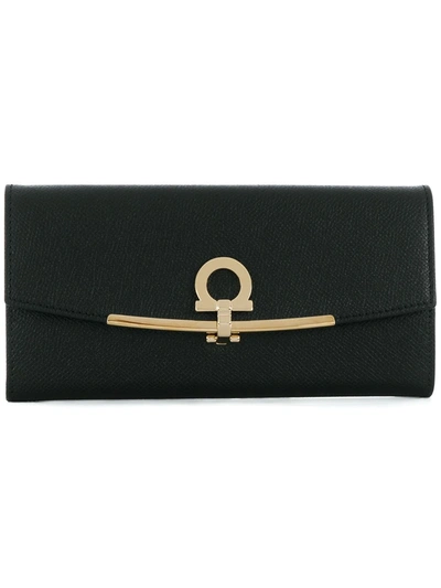 Shop Ferragamo Gancini Flip-lock Leather Purse In Black