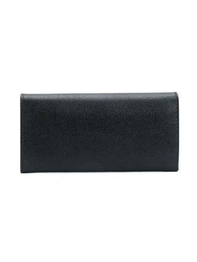 Shop Ferragamo Gancini Flip-lock Leather Purse In Black
