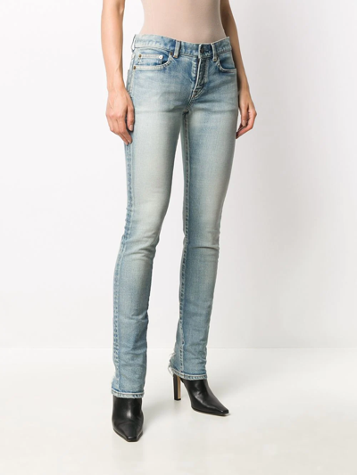 Shop Saint Laurent Low-rise Skinny Jeans In Blue