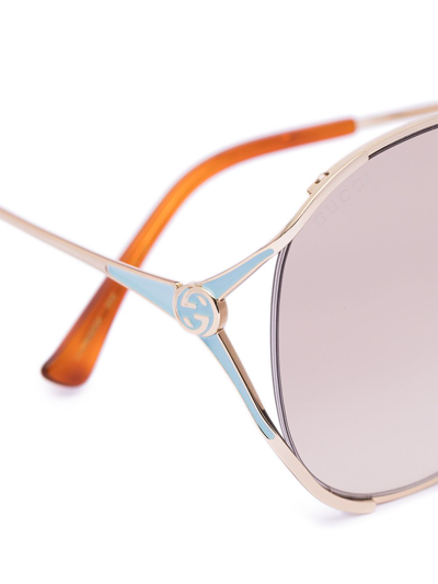 Shop Gucci Round-frame Gold-tone Sunglasses