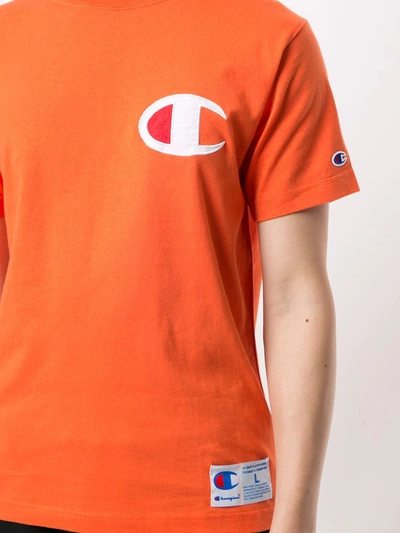 Shop Champion Logo Patch Crew Neck T-shirt In Orange