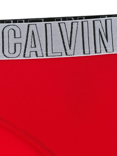 Shop Calvin Klein Logo Band Bikini Bottoms In Red