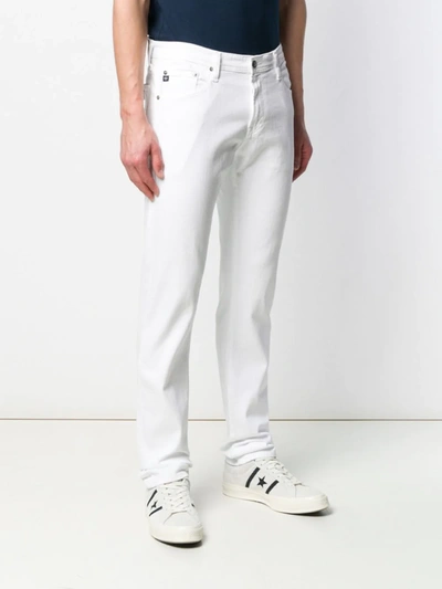 Shop Ag Straight Leg Jeans In White