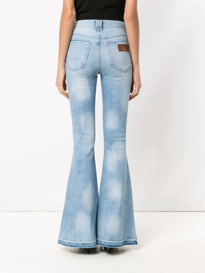 Shop Amapô Dakota Super Flared Jeans In Blue