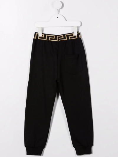 Shop Versace Barocco-logo Track Pants In Black