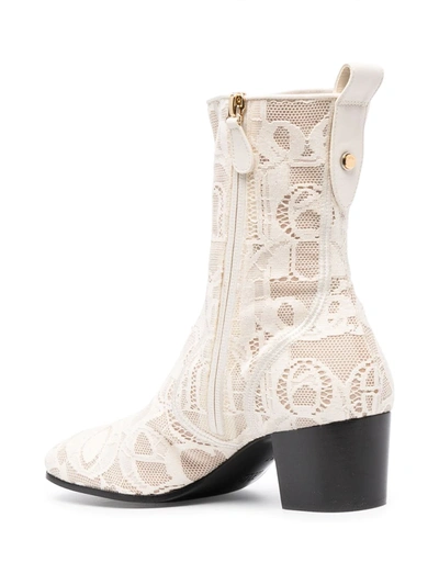 Shop Chloé Goldee Lace Ankle Boots In White