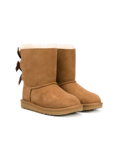 Shop Ugg Shearling Bow Boots In Brown