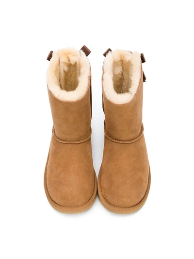 Shop Ugg Shearling Bow Boots In Brown