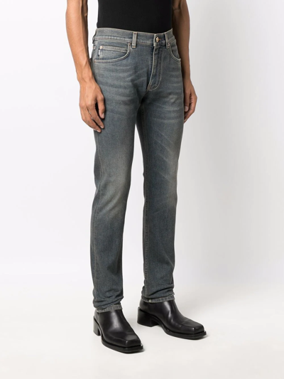 Shop Versace Mid-rise Straight-leg Jeans In Blau