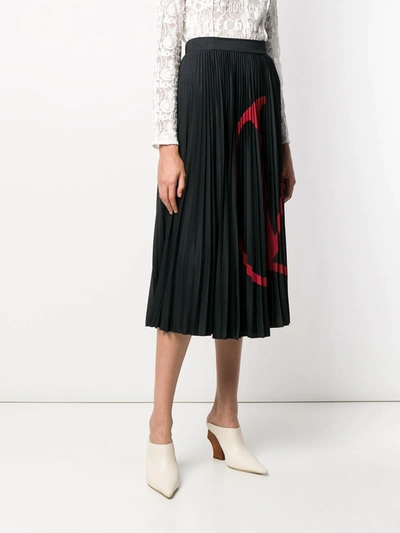Shop Valentino Vlogo Print Pleated Skirt In Black