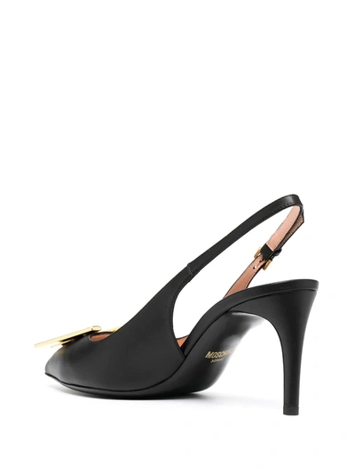 Shop Moschino M Plaque Slingback Pumps In Black
