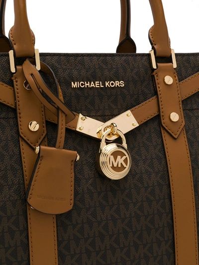 Shop Michael Michael Kors Monogram Tote Bag In Brown