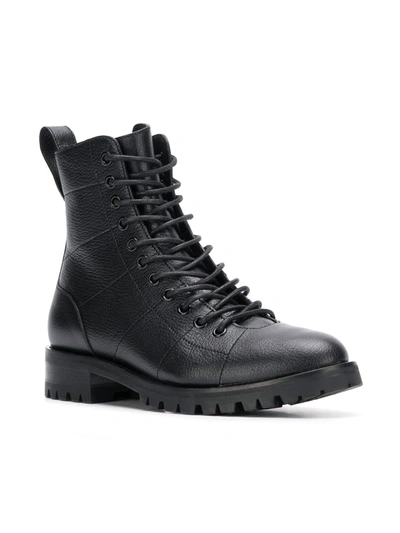 Shop Jimmy Choo Cruz Flat Combat Boots In Black