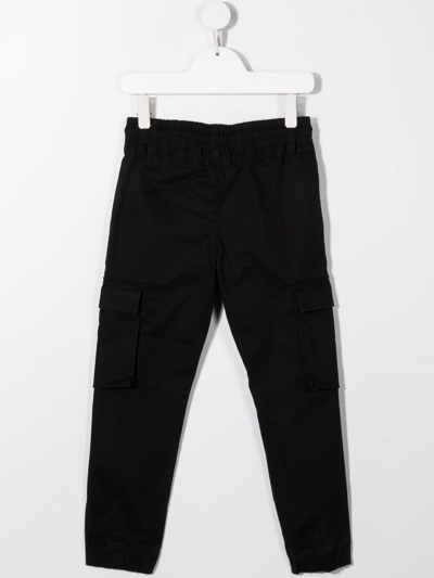 Shop Dkny Drawstring-waist Trousers In Black