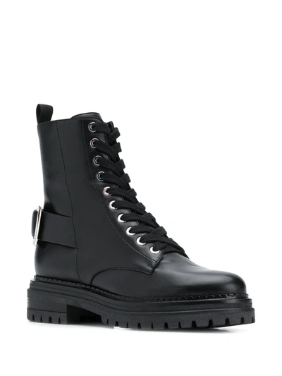 Shop Sergio Rossi Buckle-embellished Combat Boots In Black