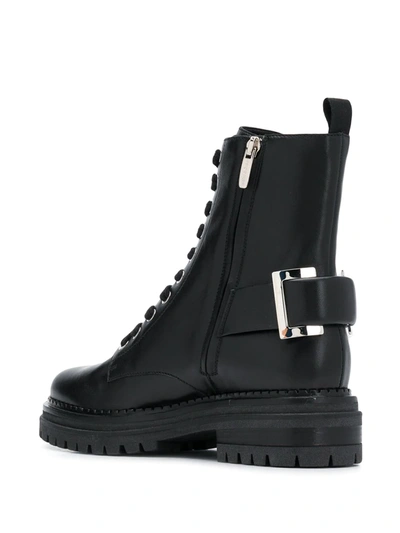 Shop Sergio Rossi Buckle-embellished Combat Boots In Black