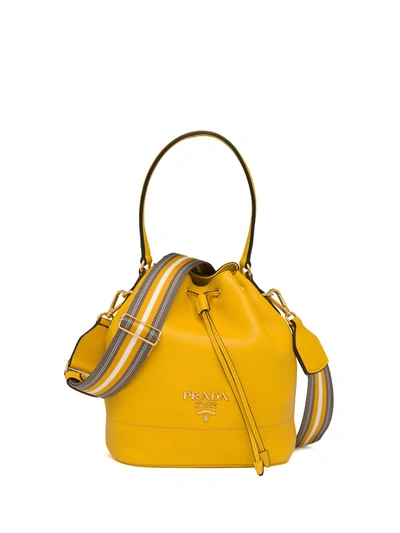 Shop Prada Drawstring-fastening Logo Bucket Bag In Yellow