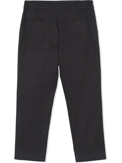Shop Burberry Embroidered Monogram Trousers In Black