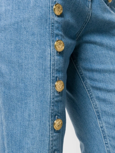 Shop Balmain Button Seam Cropped Jeans In Blue