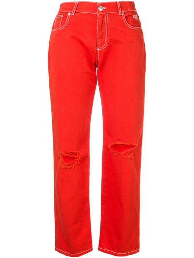 Shop Msgm Ripped Jeans In Red