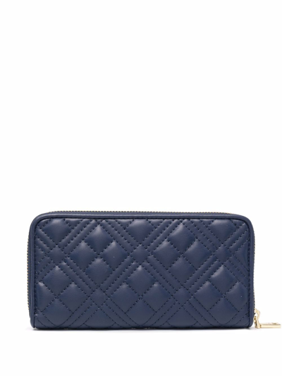 Shop Love Moschino Logo-plaque Quilted Wallet In Blau