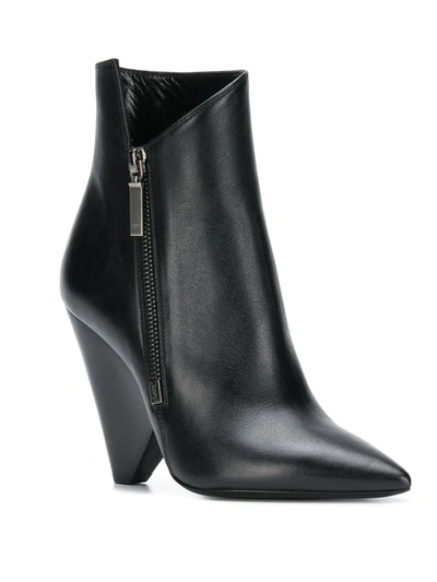 Shop Saint Laurent Niki 85 Asymmetric Boots In Black